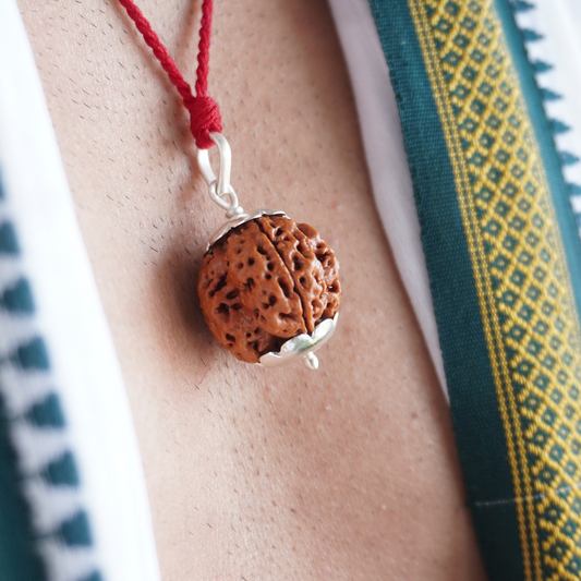 Red Thread 4 Mukhi Rudraksha pendant close up