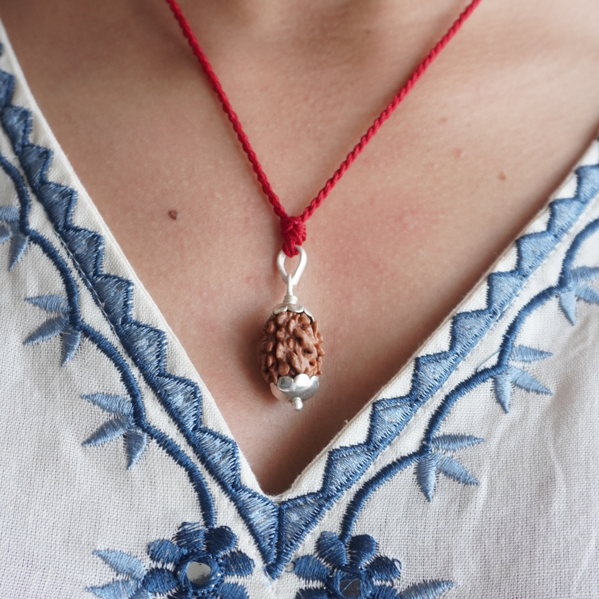 Red Thread 2 Mukhi Rudraksha pendant worn
