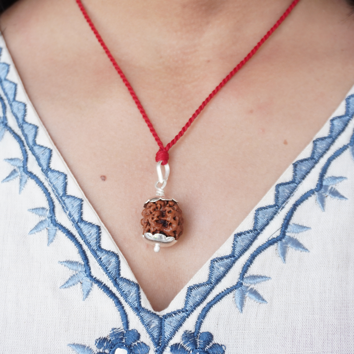 Red Thread 3 Mukhi Rudraksha pendant worn