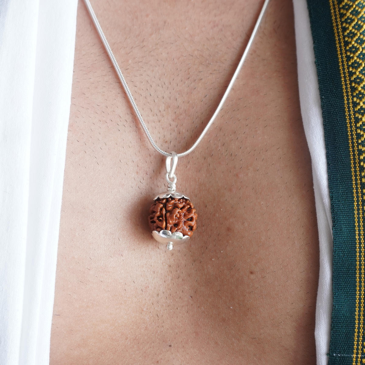 Silver Chain 3 Mukhi Rudraksha pendant worn