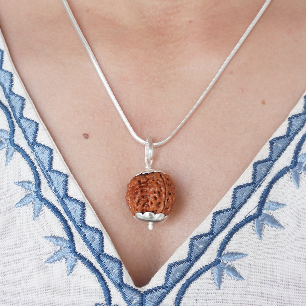 Silver Chain 4 Mukhi Rudraksha pendant worn