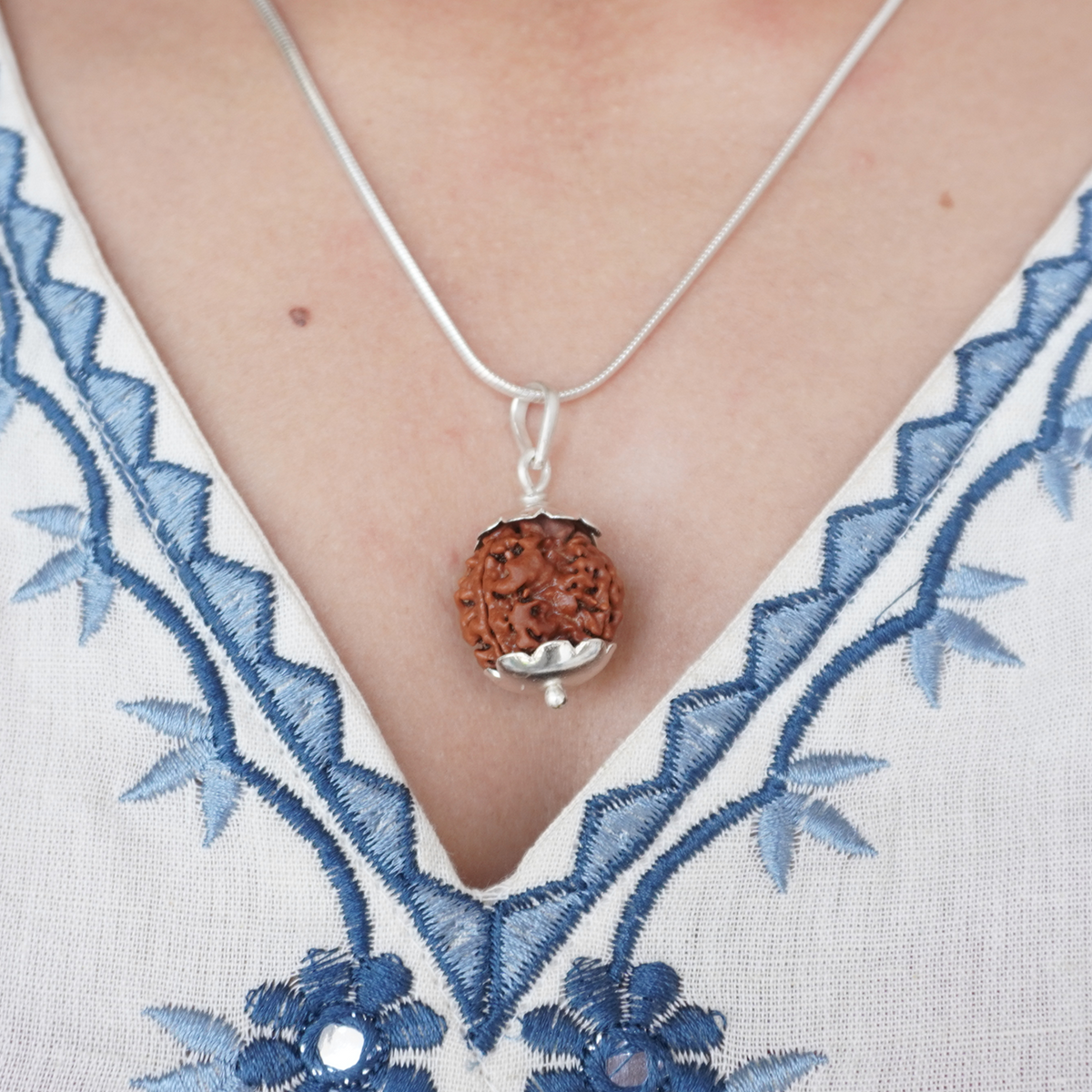 Silver Chain 3 Mukhi Rudraksha pendant worn